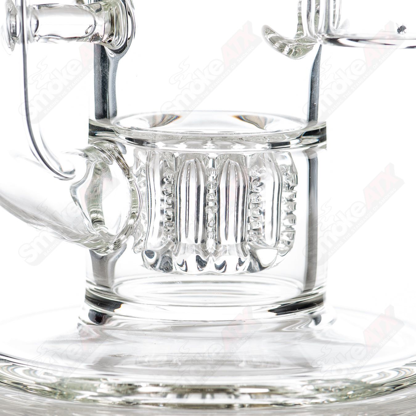 Spinning Tiki Head Scientific Tube by Carsten Carlile and Dirty Rico Glass, featuring a detailed tiki head design on a heady glass tube.