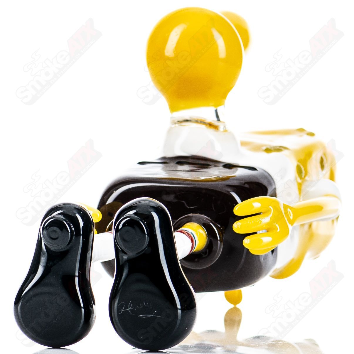 Spongebob Rig Hendy Glass concentrate rig with colorful Spongebob design, clear glass body, and intricate mouthpiece detailing.