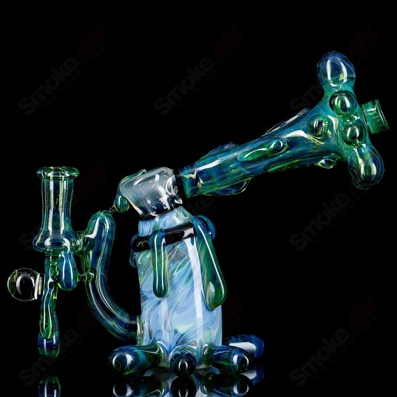 King Leo Glass spray paint can rig for concentrates, featuring a colorful heady glass design and functional concentrate rig style.