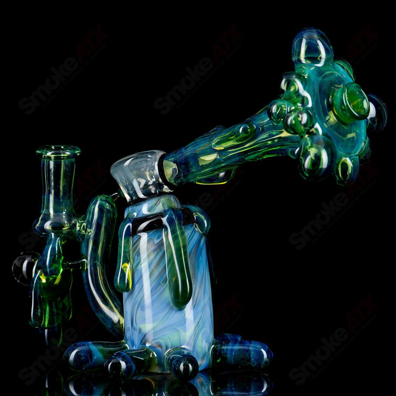 King Leo Spray Paint Can Rig, a colorful heady glass concentrate rig with spray paint can design, ideal for dabbing and concentrates.