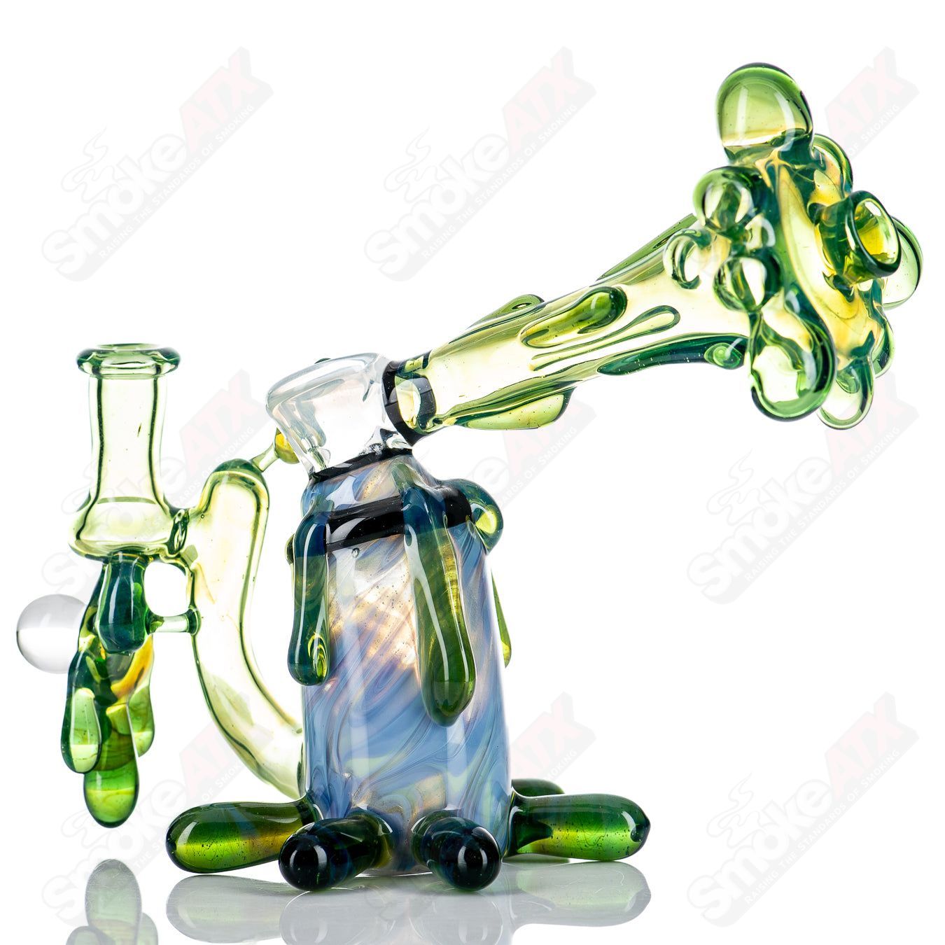 King Leo Glass spray paint can rig, a colorful heady glass concentrate rig with detailed spray paint can design.