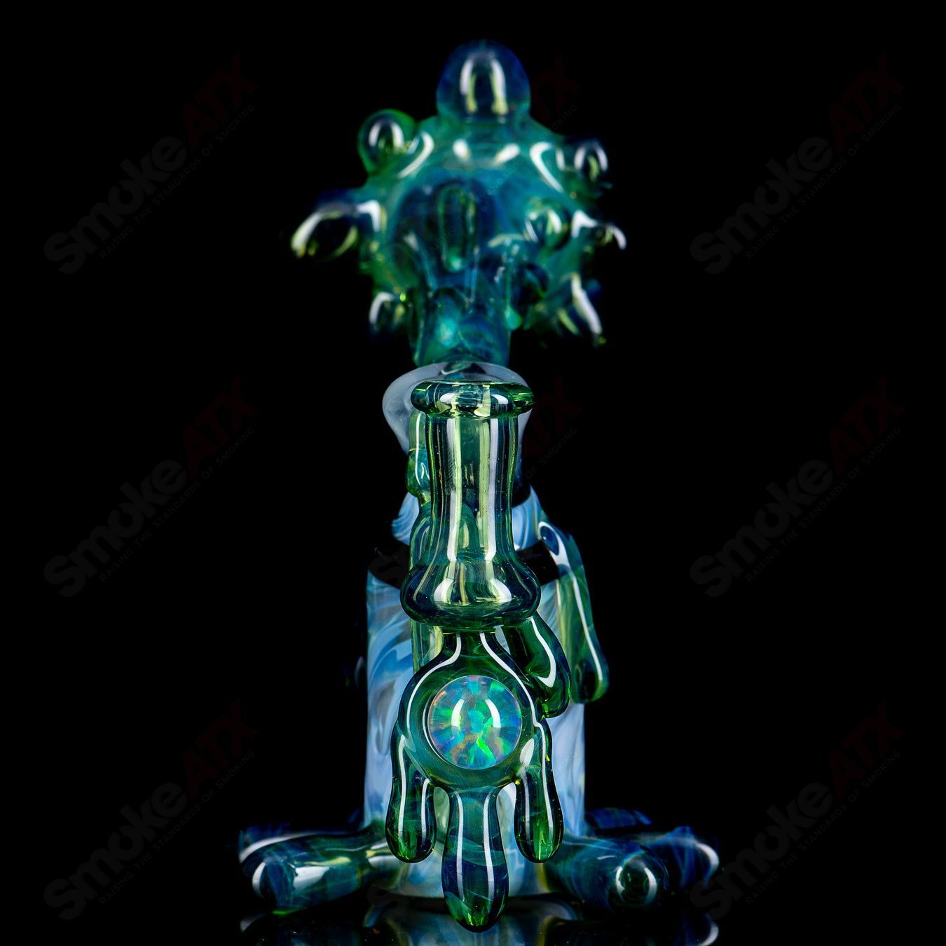 King Leo Glass spray paint can rig for concentrates, featuring vibrant glass design and functional percolator for smooth hits.