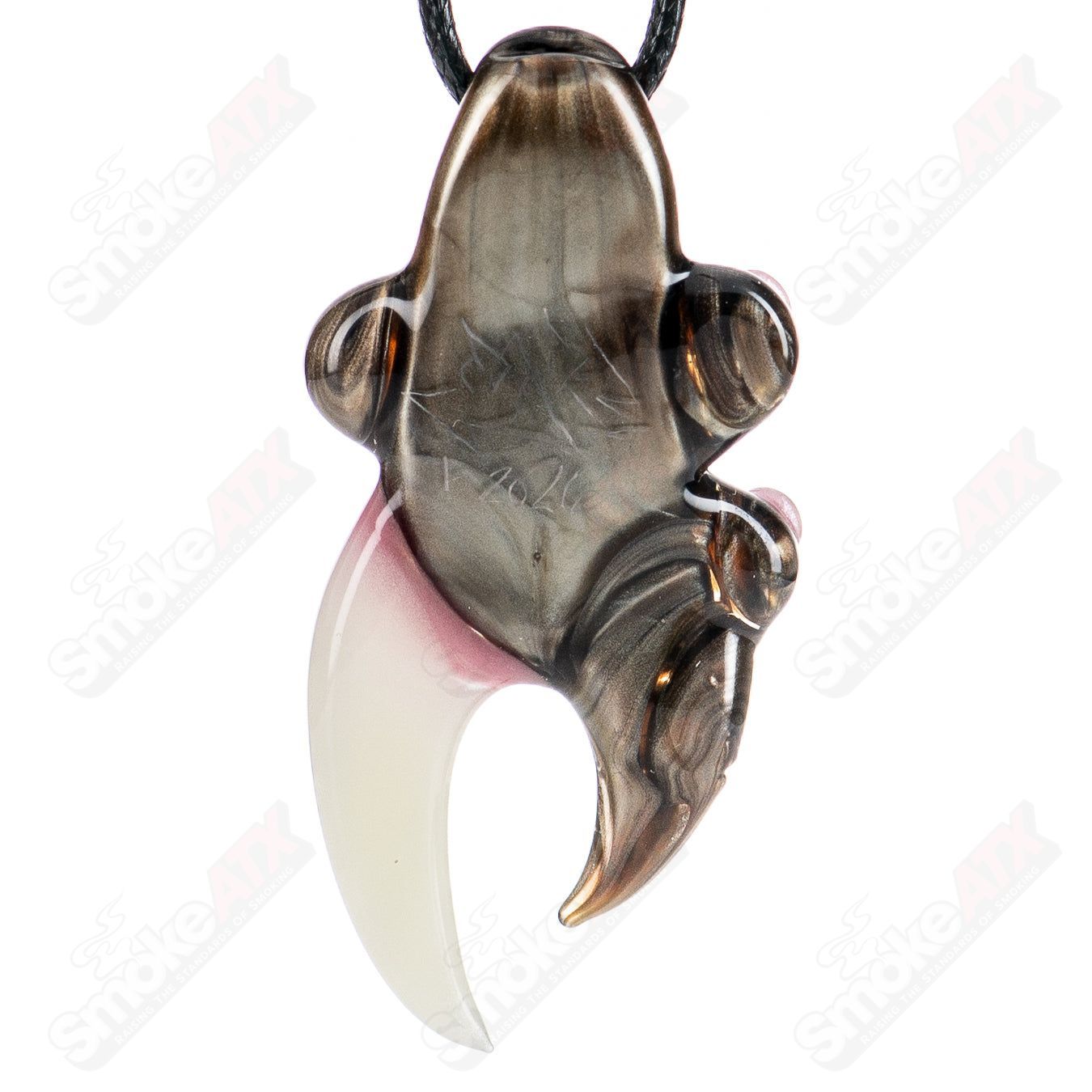 Electrum pendant by SALT, a handcrafted heady glass pendant with intricate design and vibrant colors, hanging from a leather cord.