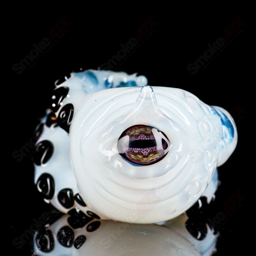 Handmade Mako Glass Seamonster Spoon in vibrant heady glass design, featuring intricate sea creature details and colorful accents.