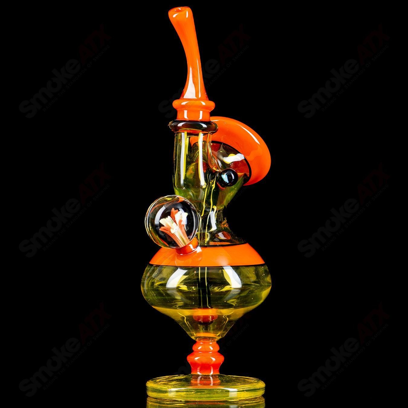 Heady glass concentrate rig called Terps Errlock by JMass, featuring intricate design and clear glass construction.