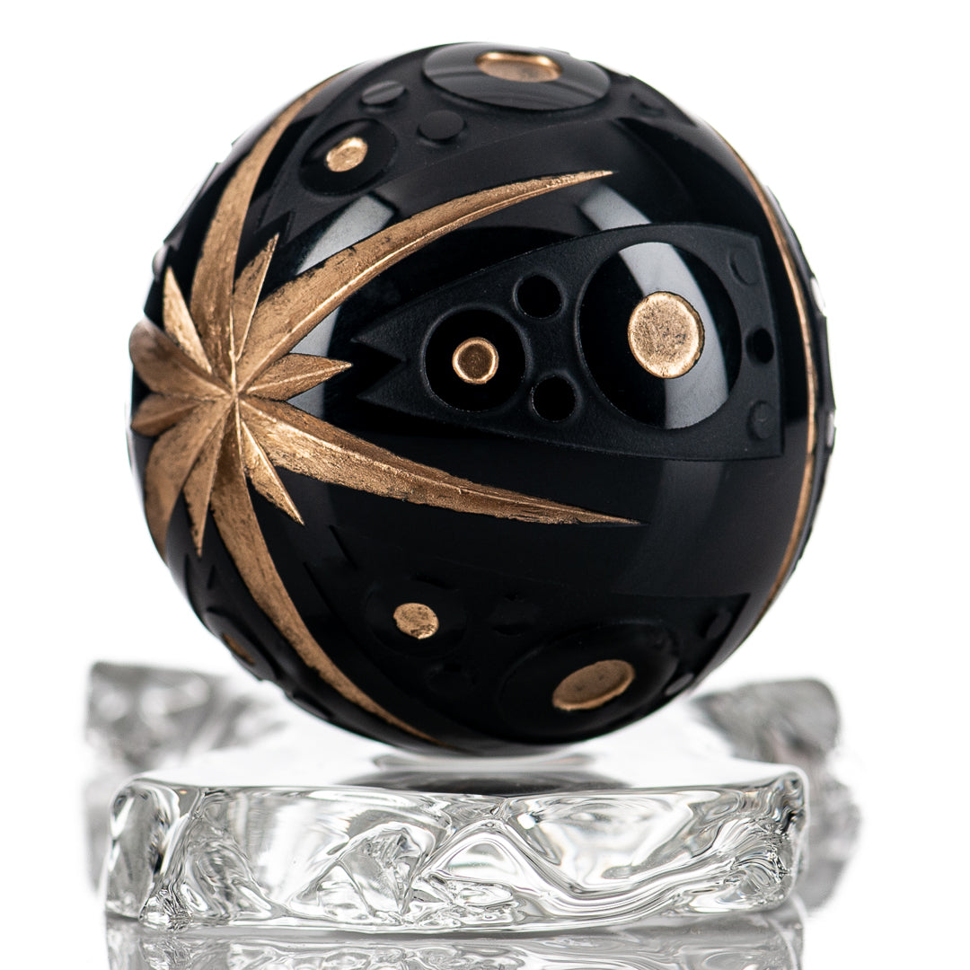 Black marble glass marbles from Fatal Facets Battuto x Fatal Facets collection, showing smooth, shiny, rounded marble surfaces.