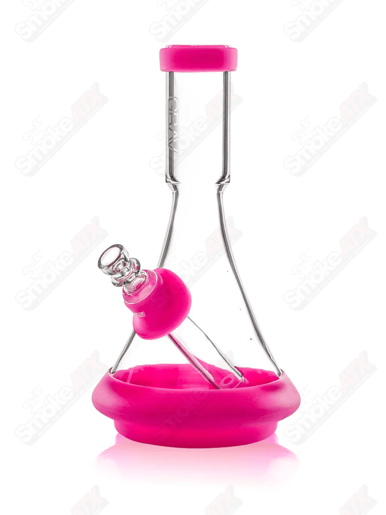 Toxic pink and clear glass deco beaker waterpipe with silicone accents by GRAV Labs, featuring a stylish design and sturdy build.