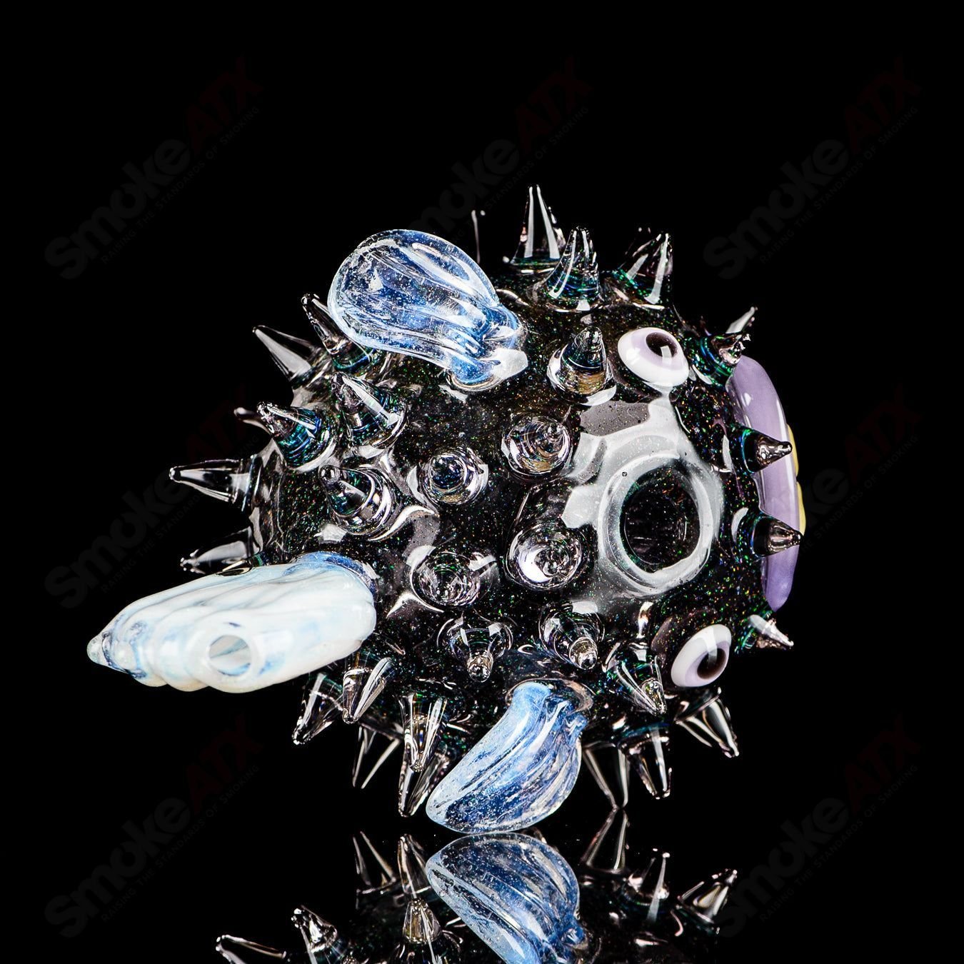 Transparent crushed opal puffer rig by Chadd Lacy Glass, heady glass concentrate rig with intricate glasswork and vibrant design.