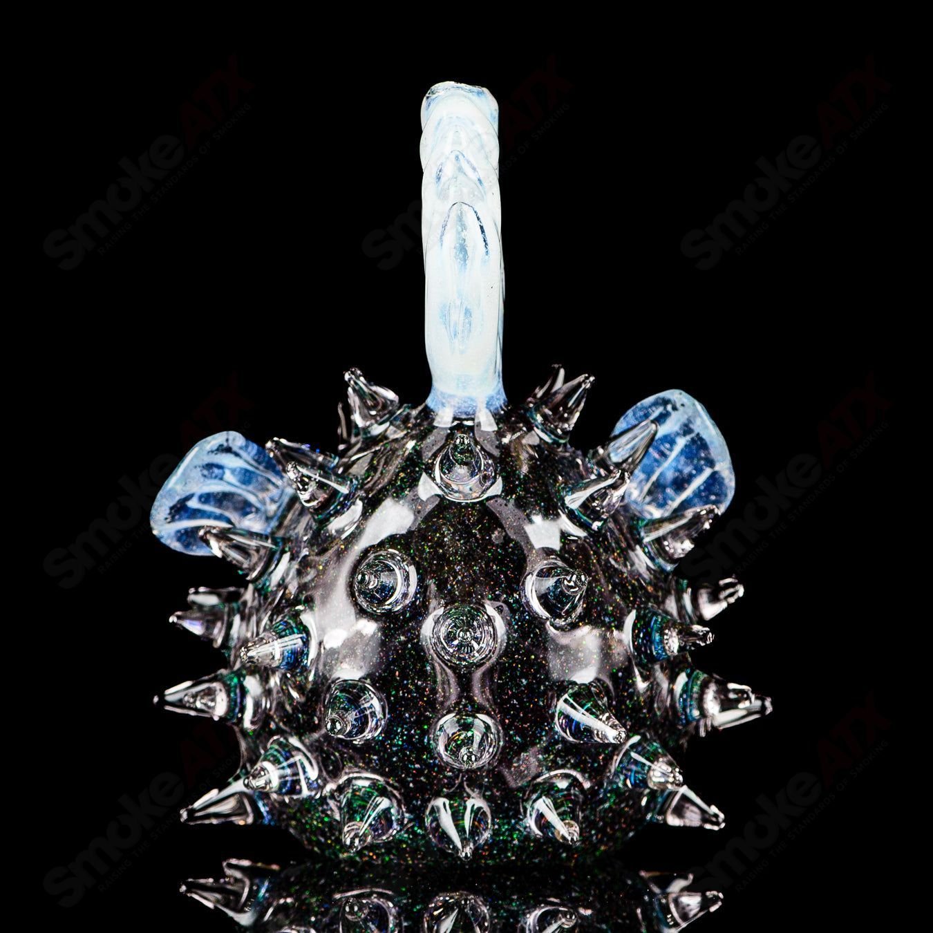 Transparent crushed opal puffer rig by Chadd Lacy Glass, heady glass concentrate rig with intricate glasswork and vibrant design.