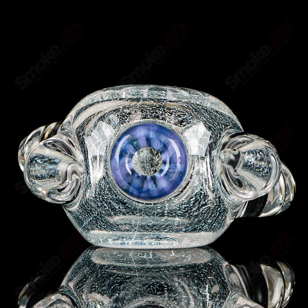 Transparent Dichro 4-Horned Spoon glass hand pipe with purple accent, signed by JMK Glass, featuring a detailed horned design.