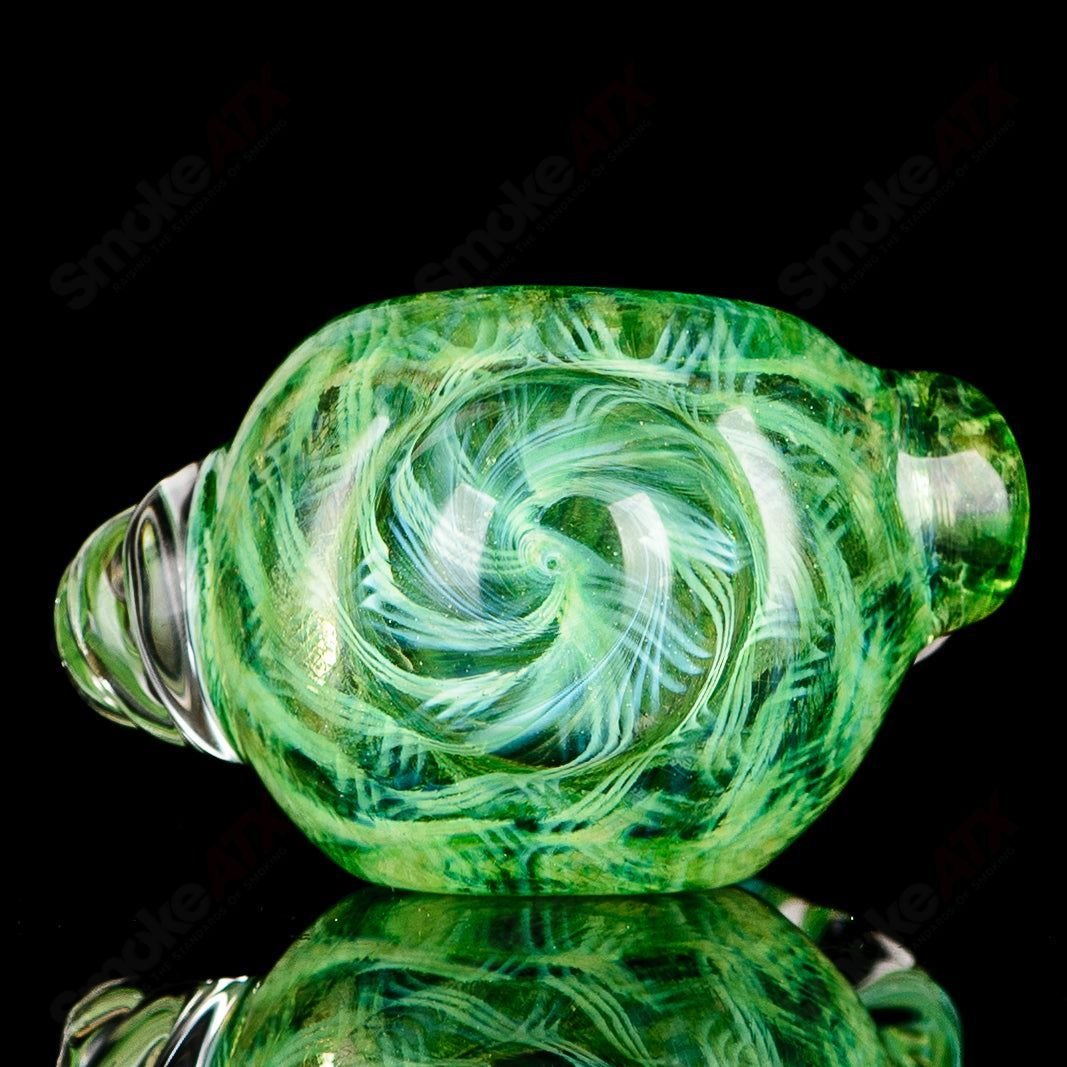 Transparent green I/O coil spoon pipe with clear horn accents, signed by JMK Glass, perfect for heady glass enthusiasts.