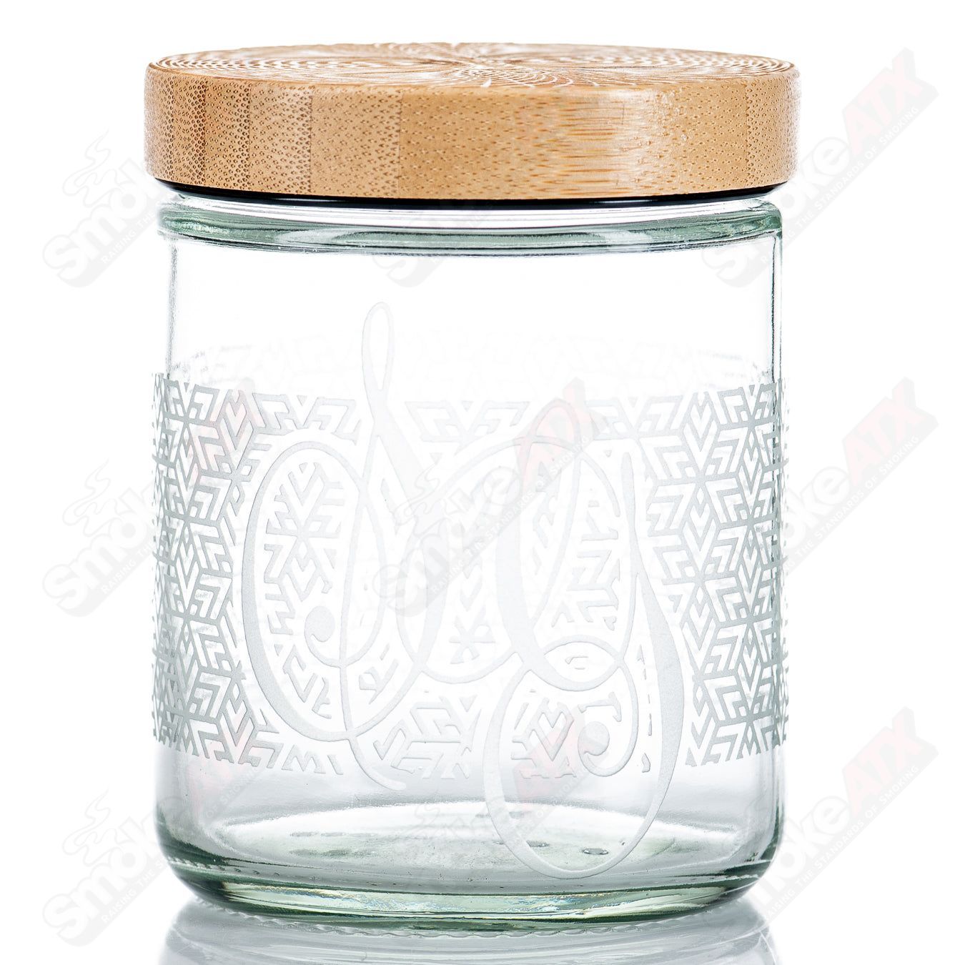 Sovereignty Glass Tri Star Pattern Nug Jar with bamboo lid, clear glass container for storing small items or herbs.