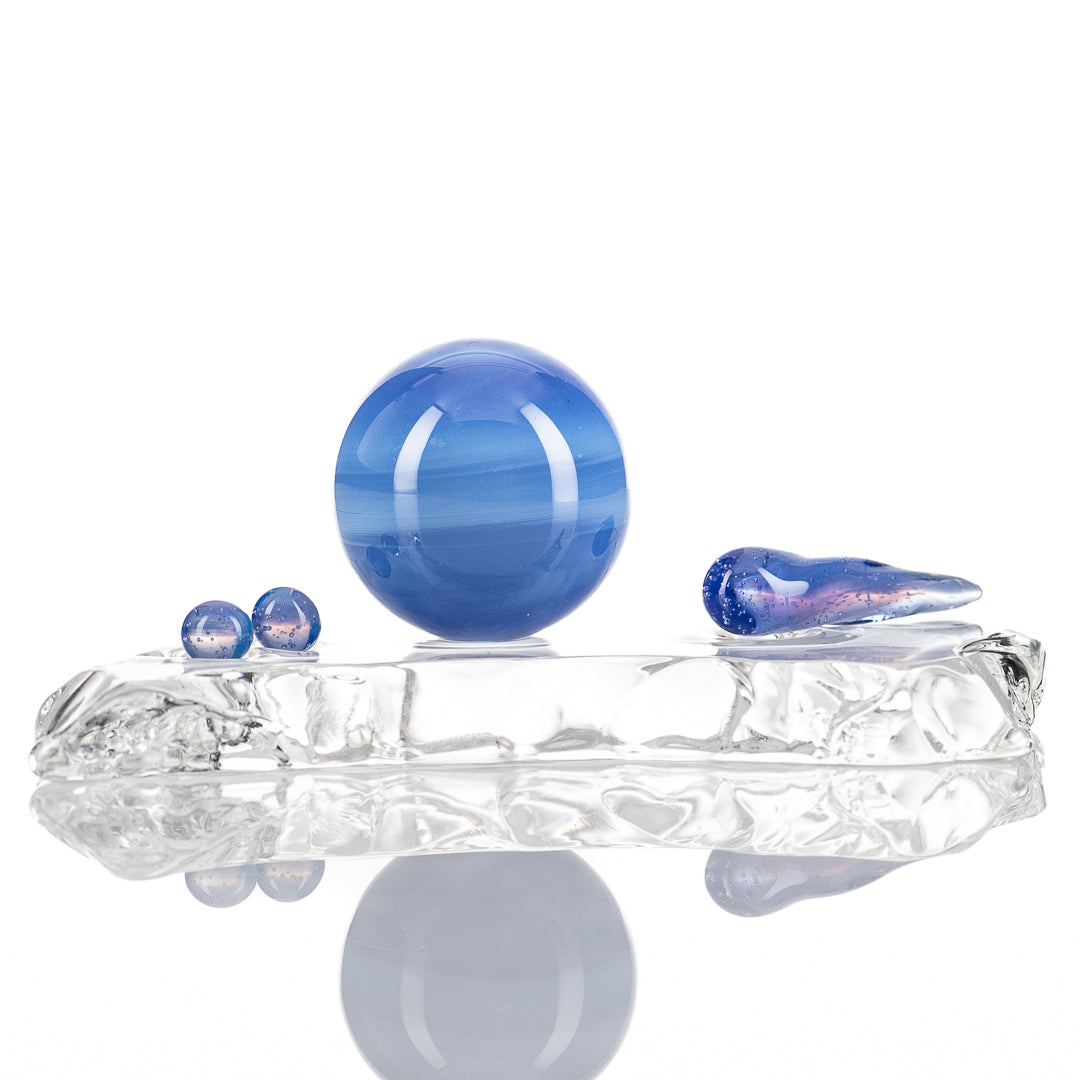 Wam Glass Terp Slurper Marble Set with glass tools for concentrate handling, featuring colorful marbles and a sleek glass design.
