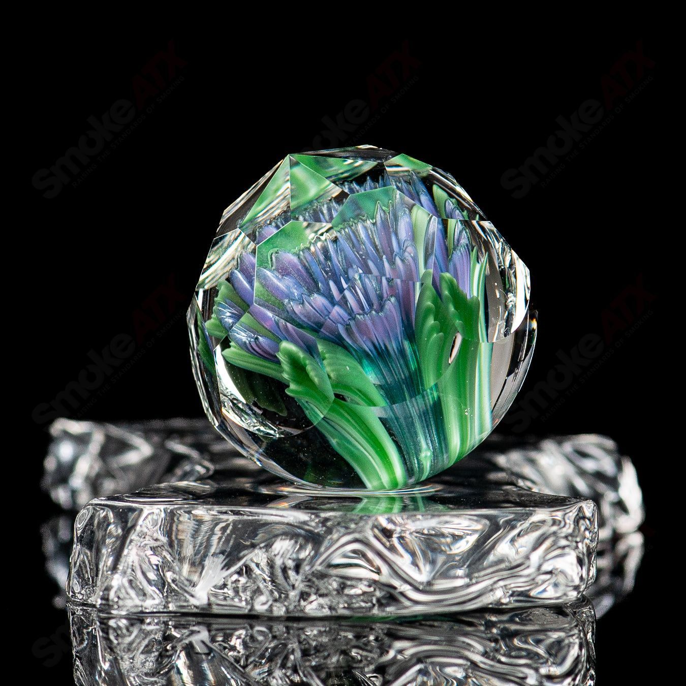 Colorful Flower Marble #2 by Fatal Facets, glass impact marble with intricate floral design and vibrant marbling details.