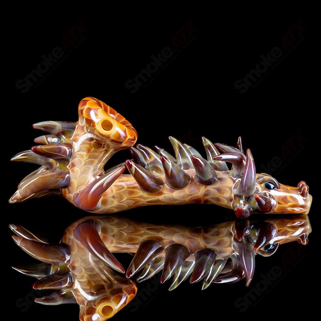 Focused Fire Dragon Sherlock glass pipe featuring a detailed dragon design and a clear, focused Sherlock style mouthpiece.