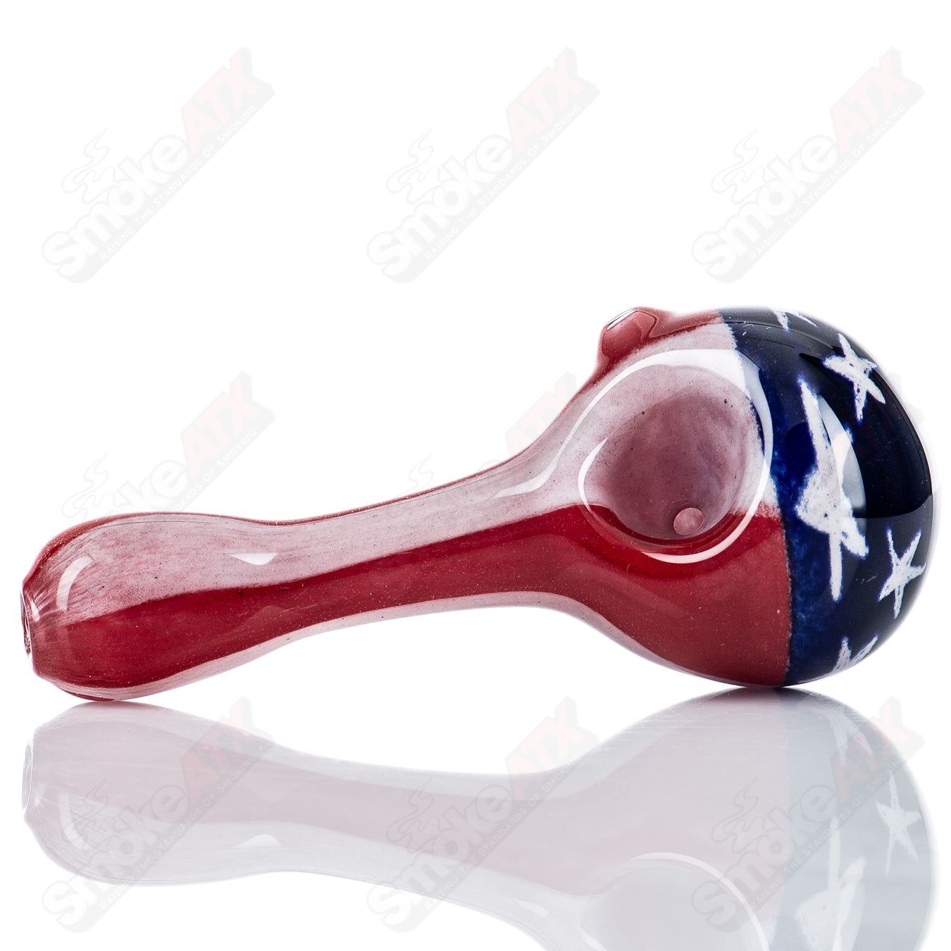 Glass USA flag spoon pipe by Steve Hoffman featuring a detailed American flag design and clear glass construction.