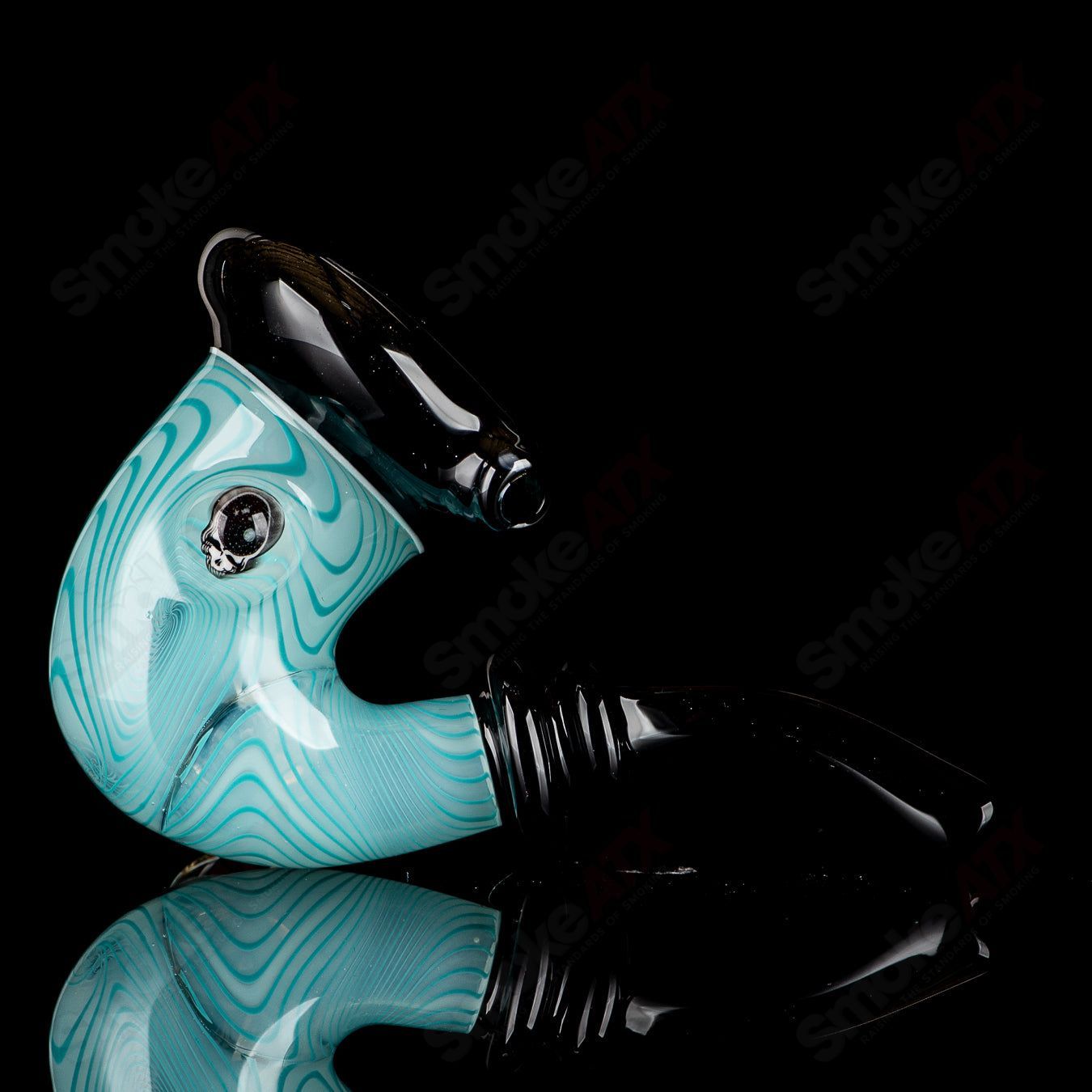 UV Aqua Linework Sherlock glass pipe by JMass, featuring vibrant blue and green linework details on a clear Sherlock-style heady glass.