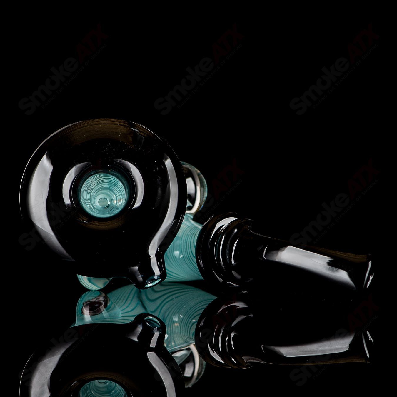 UV Aqua Linework Sherlock heady glass pipe by JMass featuring vibrant blue and green linework design with a classic Sherlock shape.