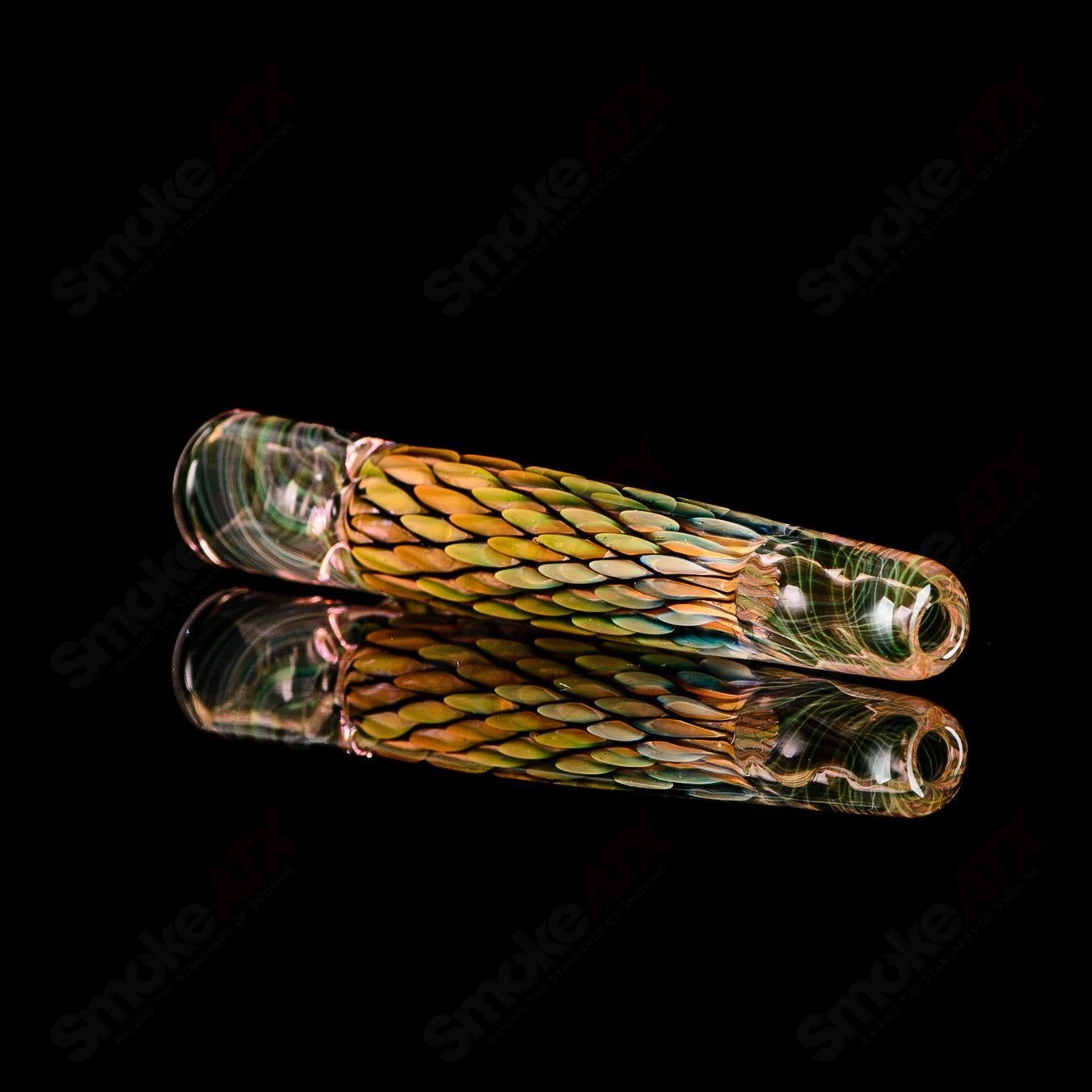 UV Chillum BCM Glass, a colorful heady glass chillum with vibrant UV-reactive design and clear glass accents.