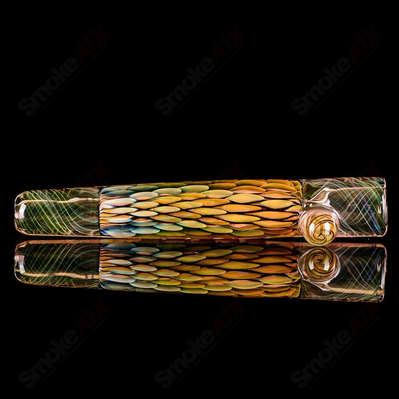UV Chillum BCM Glass heady glass chillum with vibrant UV-reactive design and clear glass construction.