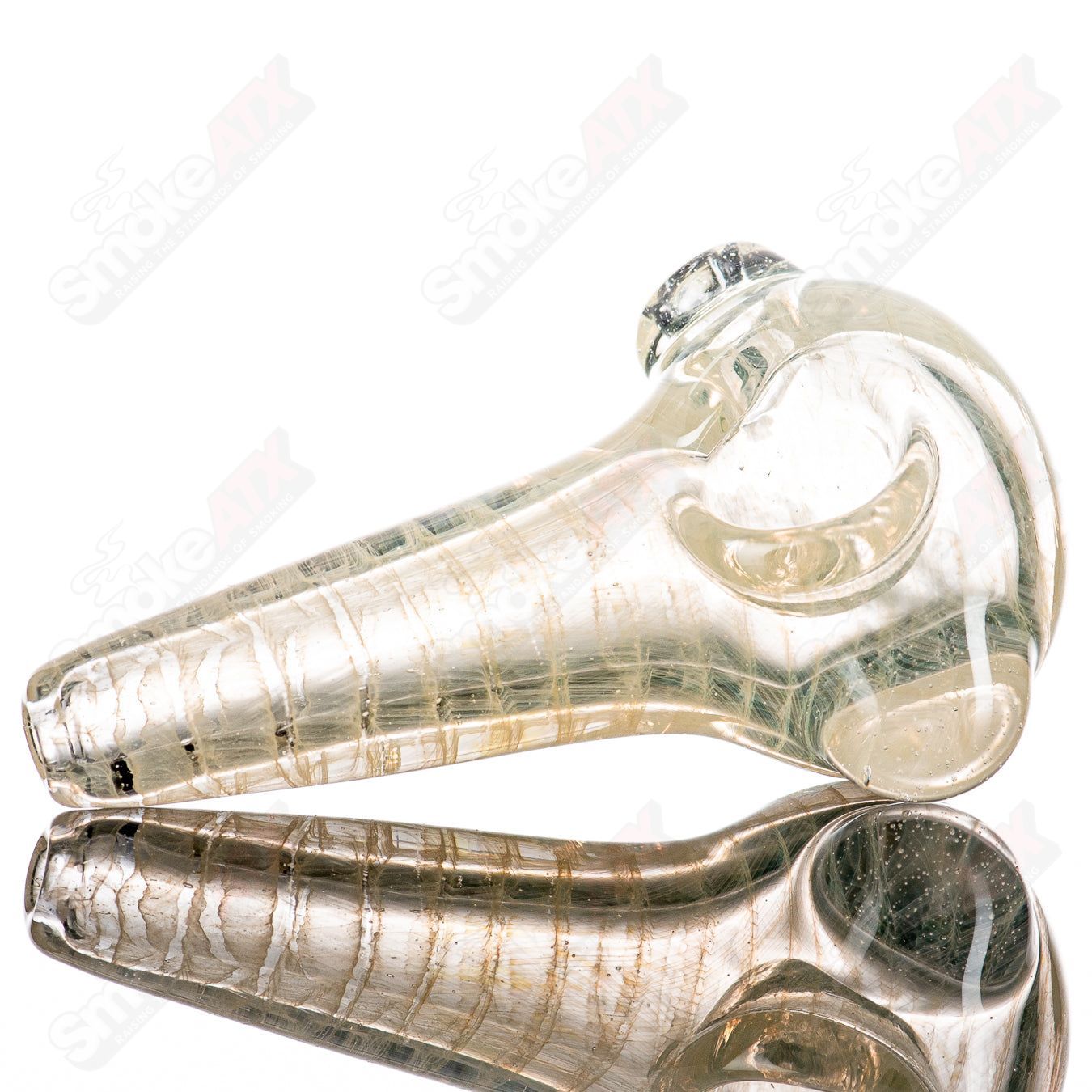 UV Fume Spoon by JMK Glass, a hand pipe with vibrant UV-reactive fume glass design for smoking enthusiasts.