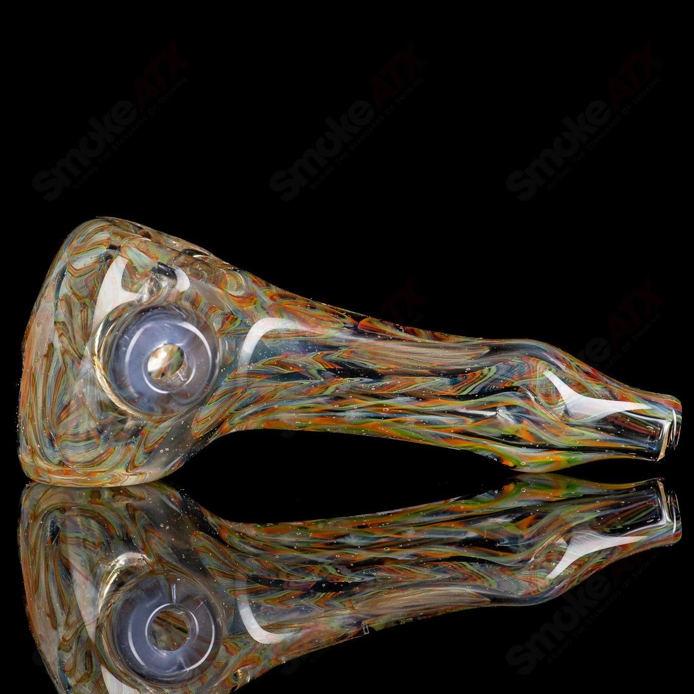 UV Inside Out Rainbow Spoon by JMK Glass, colorful hand pipe made of glass with vibrant rainbow and UV-reactive design.