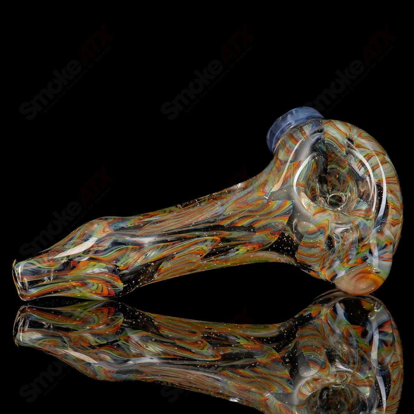 UV Inside Out Rainbow Spoon by JMK Glass, colorful hand pipe featuring vibrant rainbow and UV-reactive glass details.