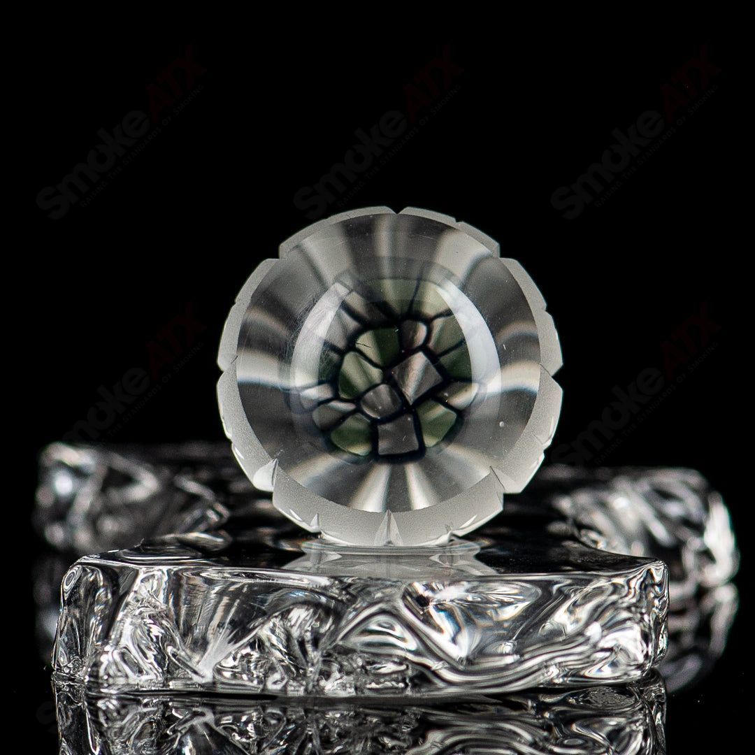 Fatal Facets Gemini Fatal Facets marble with intricate marble patterns and vibrant colors, designed by Fatal Facets Heady Glass.
