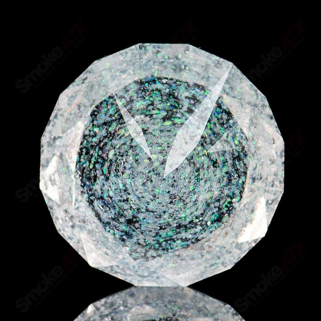 Crushed opal gem marbles by Fatal Facets, featuring vibrant, colorful glass with intricate patterns and a polished finish.