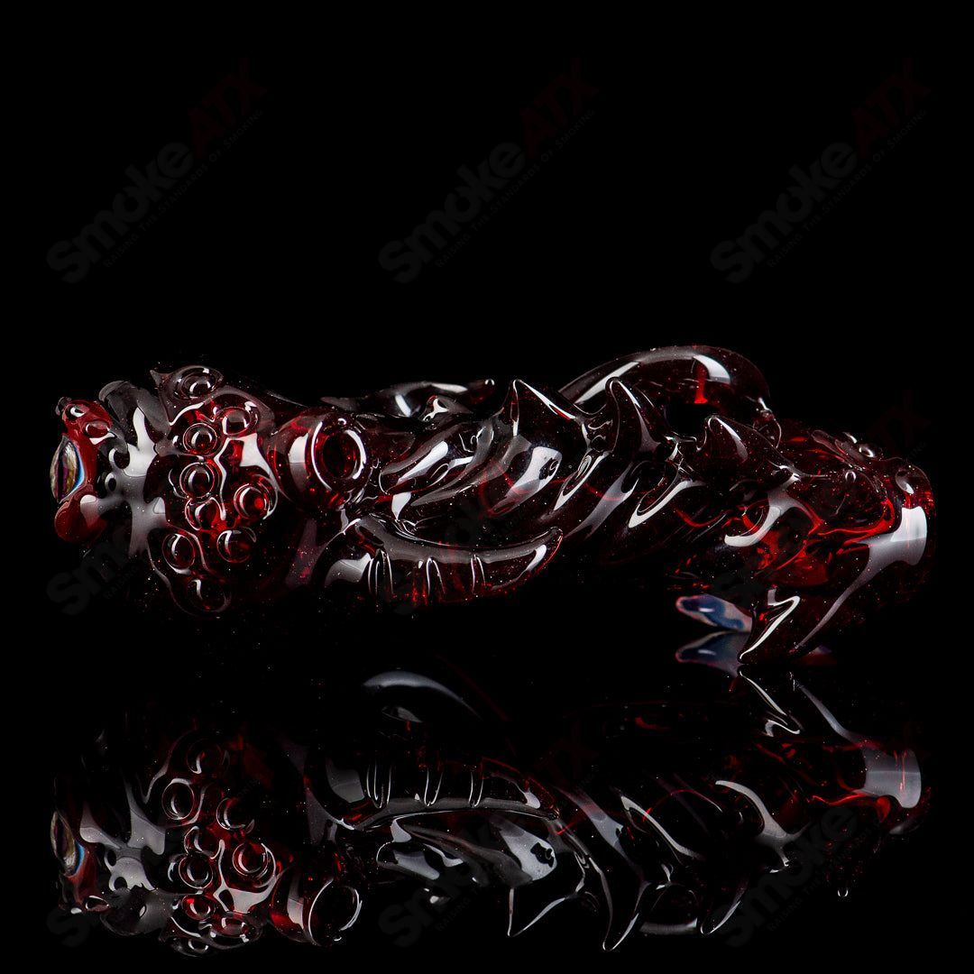 Mako Glass #5 Seamonster Spoon hand pipe with colorful glass design and intricate sea creature details.