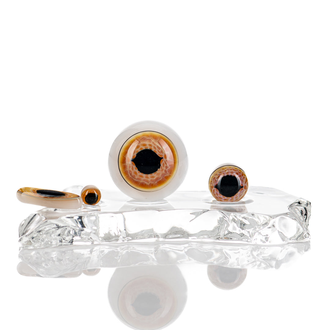 Deluxe Indo Glass Eye Slurper Set featuring clear glass with textured design for smooth vapor inhalation and aesthetic appeal.