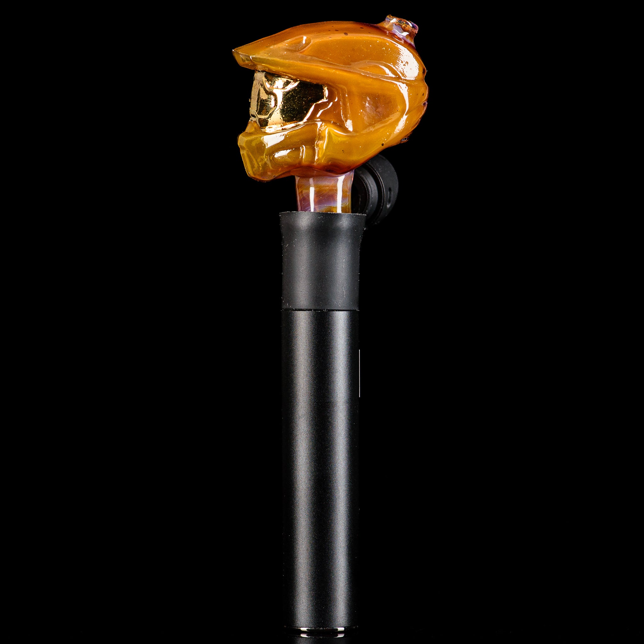 Glass Puffco tops Halo Pivot Mouthpiece by Tony Kazy, featuring clear glass design and ergonomic shape.