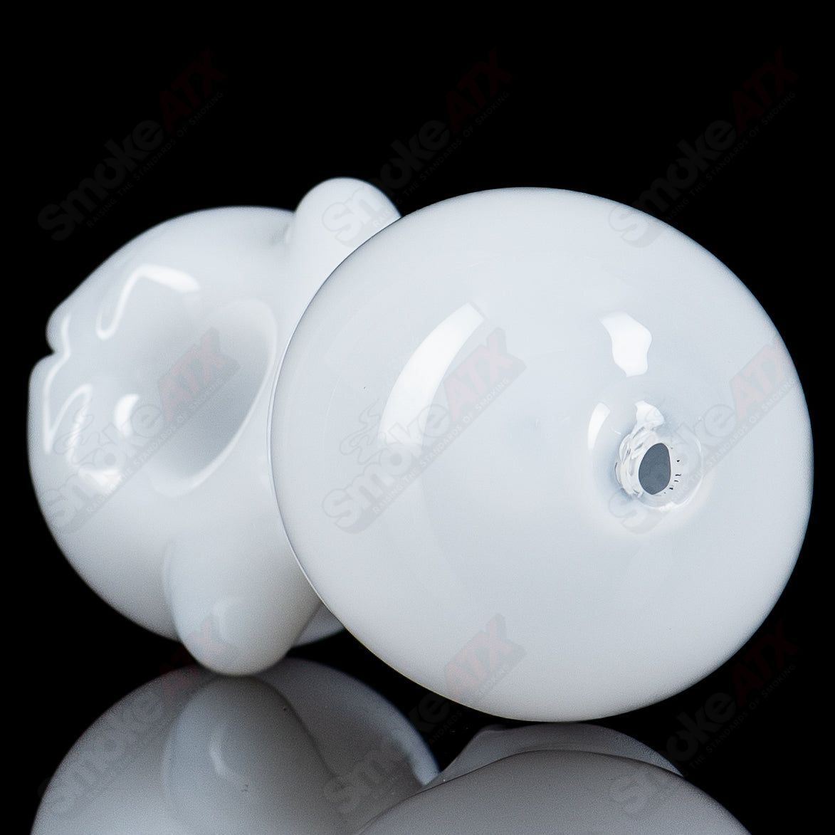 White alien hand pipe with UV crushed opal eyes by Ghost Glass, featuring a sleek heady glass design for smoking.