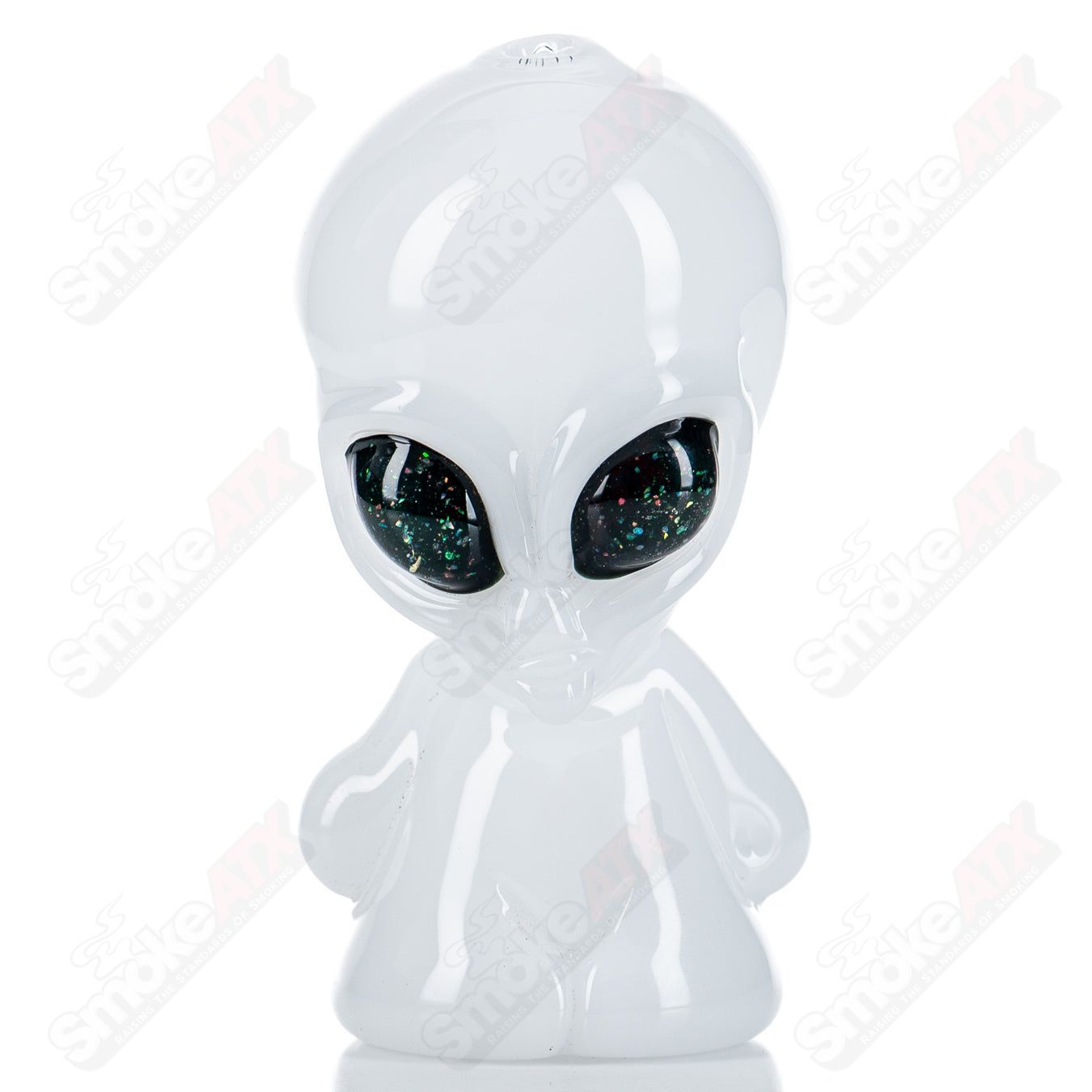 White alien hand pipe with UV crushed opal eyes by Ghost Glass, featuring intricate heady glass design and vibrant colors.