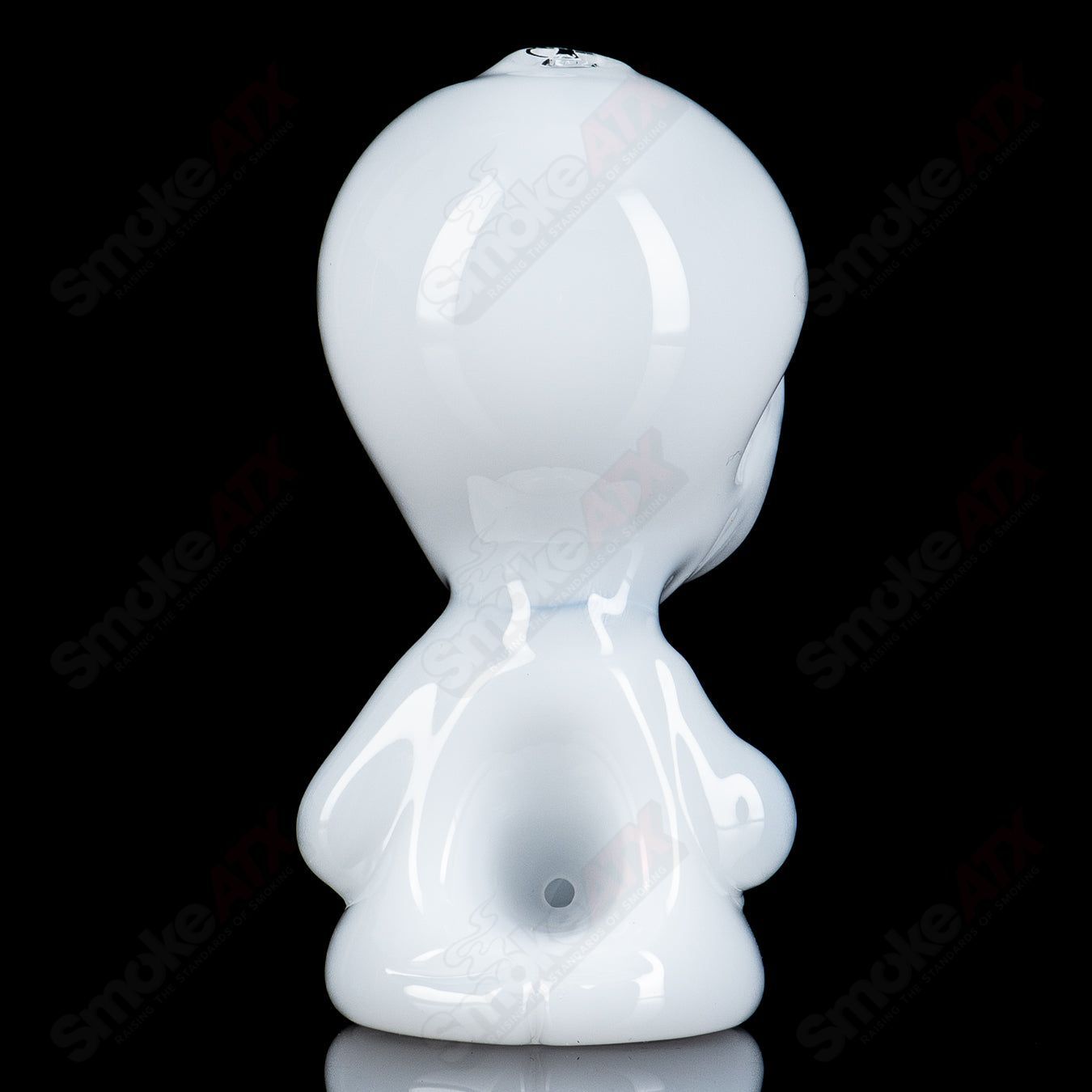White alien hand pipe with UV crushed opal eyes, crafted by Ghost Glass, featuring intricate heady glass design.