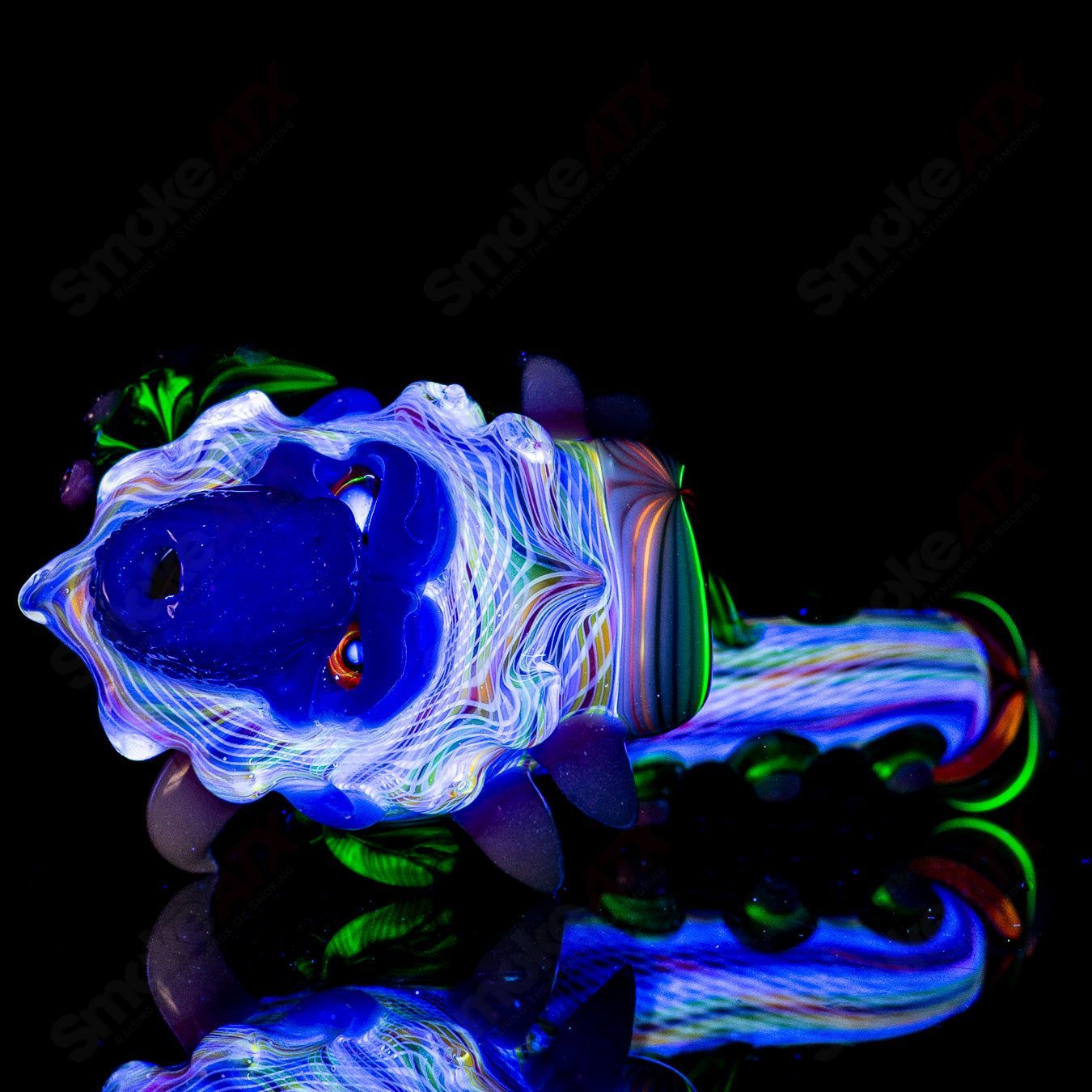 Wooklock heady Sherlocks glass pipe by Smoke ATX, featuring vibrant design elements and intricate glass craftsmanship.