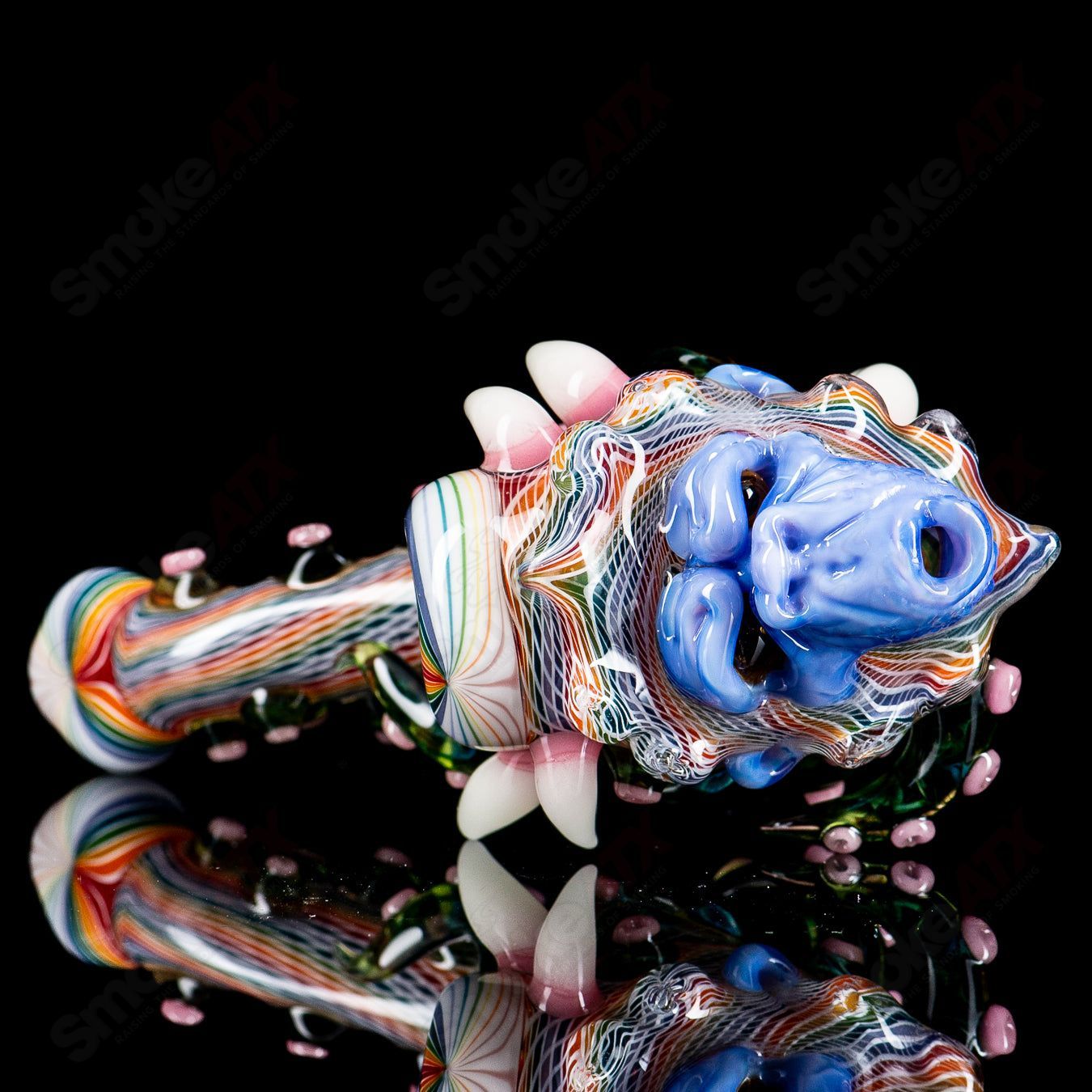Colorful Wooklock Sherlocks heady glass pipe by Smoke ATX, featuring intricate design and vibrant glass artistry.