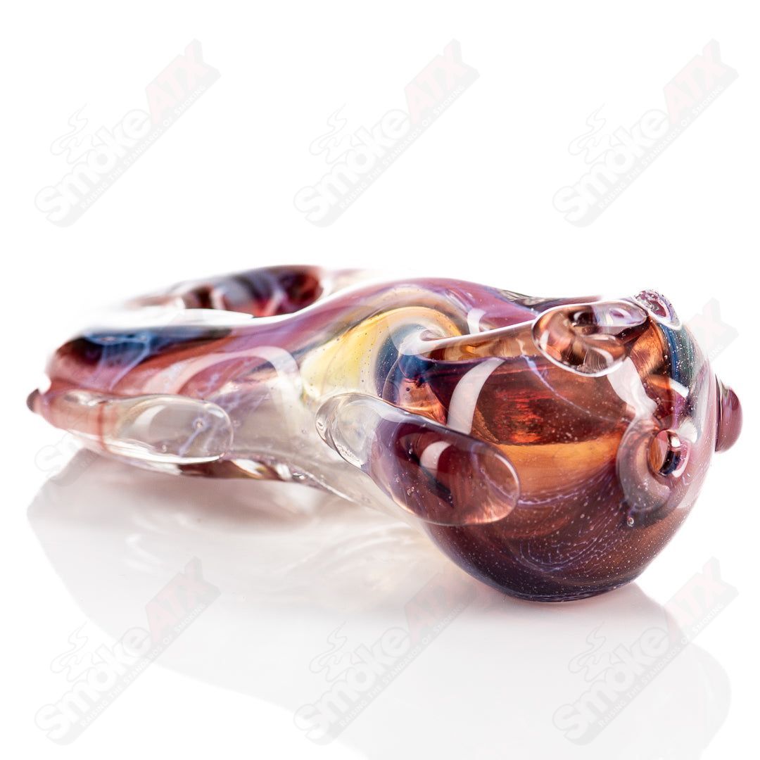 Clear glass donut-shaped pipe by Nobody Glass, hand pipe with a colorful design, suitable for dry herb or tobacco use.