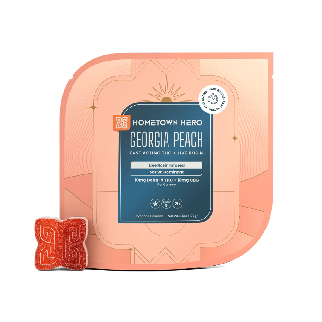 Hometown Hero Georgia Peach live rosin D9+CBD gummies, hemp edibles with peach flavor, show the colorful gummy candies on a white background.