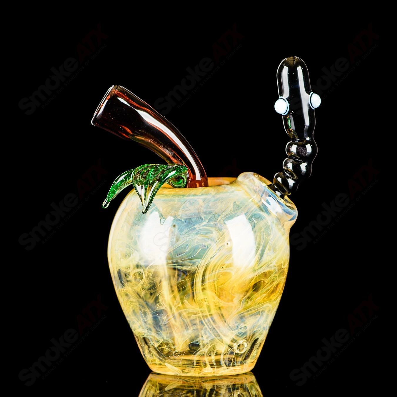 Yellow Apple Rig with Worm Dabber Pouch Glass, a colorful heady concentrate rig with detailed glass design and matching dabber pouch.