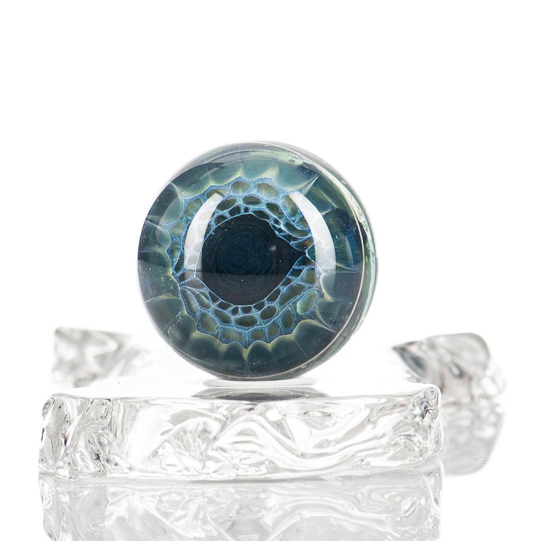Colorful Cropal Wag Eye Mib Indo Glass heady glass with intricate marble designs, showcasing artistic glass craftsmanship.
