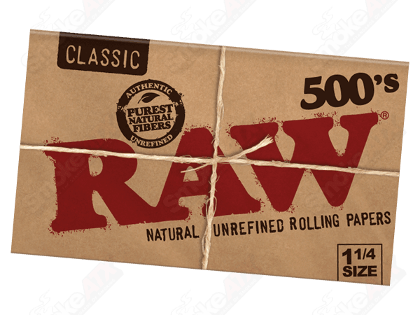 RAW Classic 500's 1 1/4 rolling papers in natural raw paper, stacked in a pack for rolling cigarettes or joints.