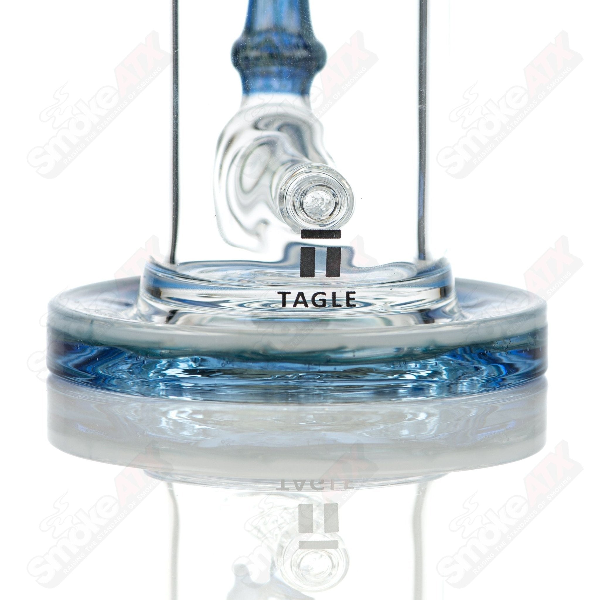 Tagle Glass 18mm 50mm Wrap n Rake inline tube bubbler with clear glass and intricate wrap and rake design.