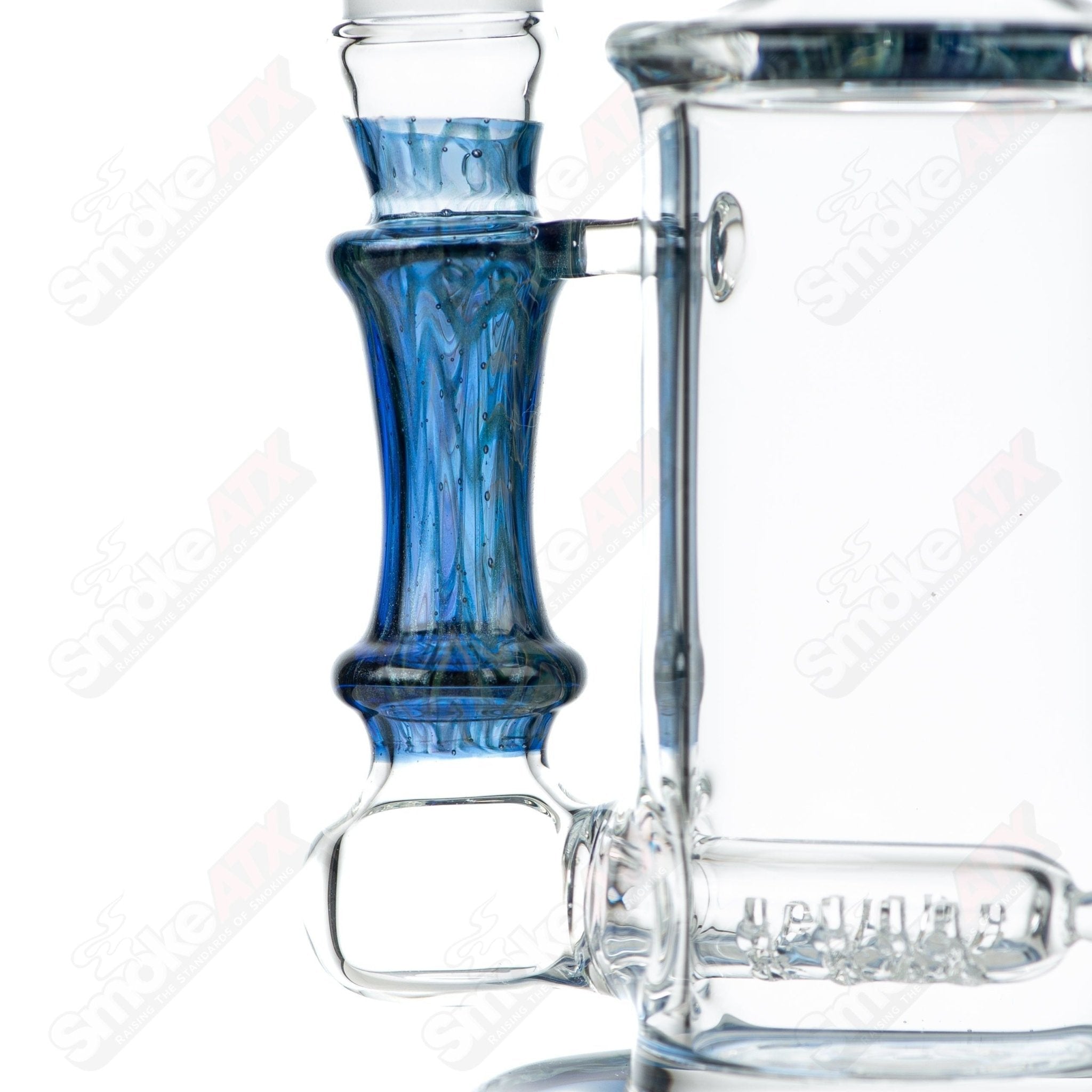 Tagle Glass inline tube bubbler with 18mm and 50mm wrap n rake design, clear glass construction, compact and stylish.