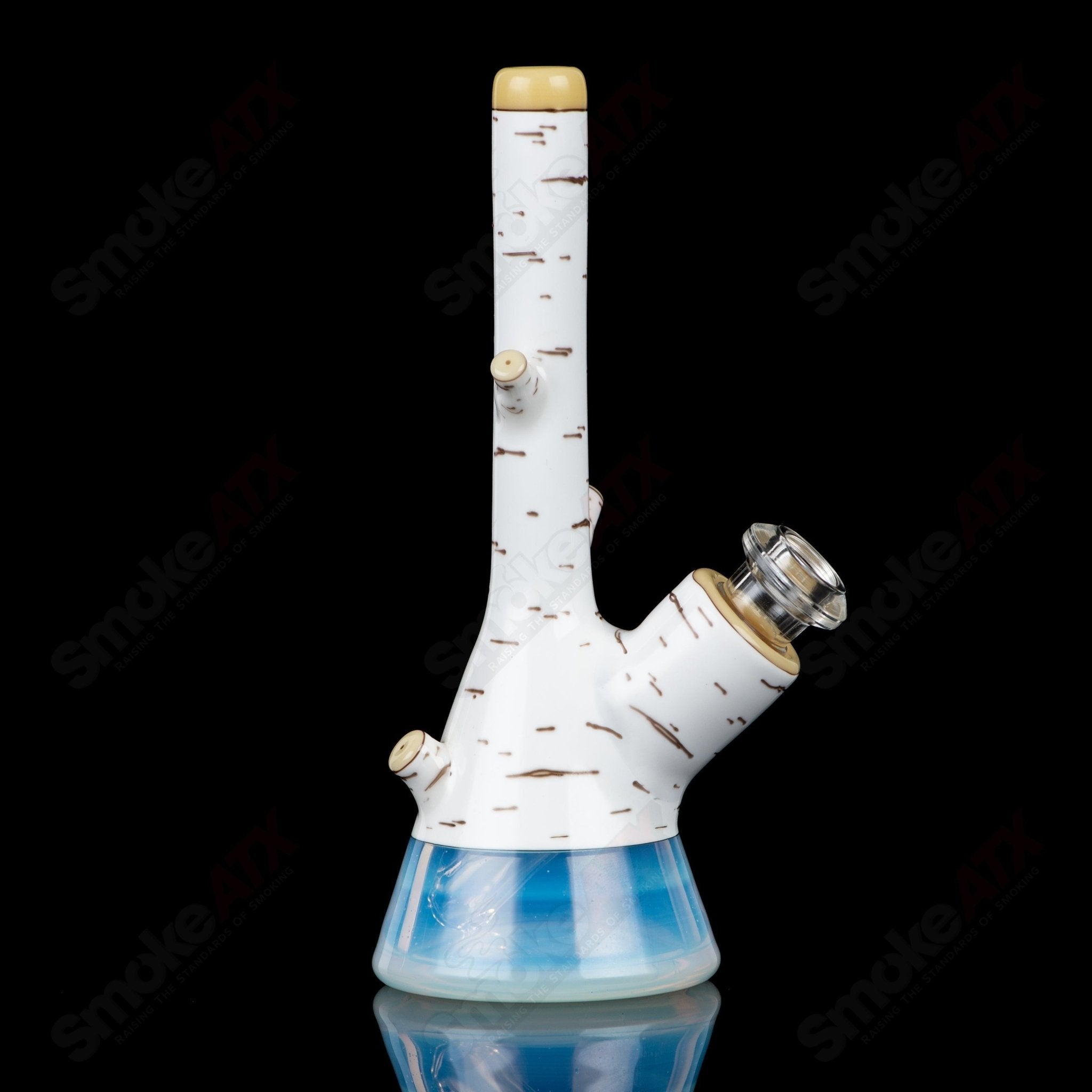 Foster Glass Birch Mini Tube Heady Glass with clear glass body and intricate design, showcasing compact, artistic glass craftsmanship.