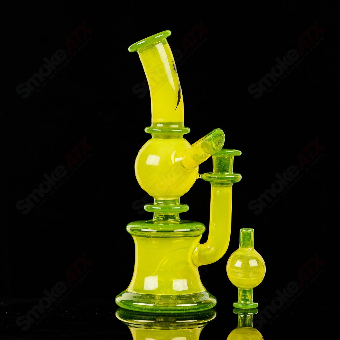 Colorful RAM Xhalerator concentrate rig by Robert Mickelsen, featuring intricate glass art and vibrant design elements.