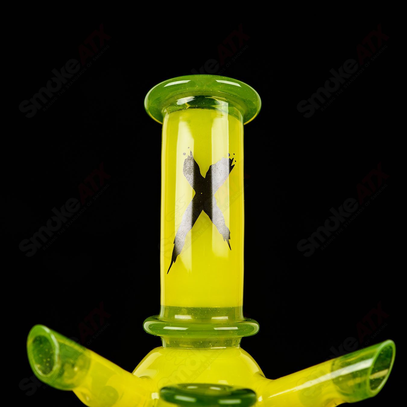 Colorful Xhalerator RAM Robert Mickelsen glass concentrate rig with intricate glasswork and vibrant hues.