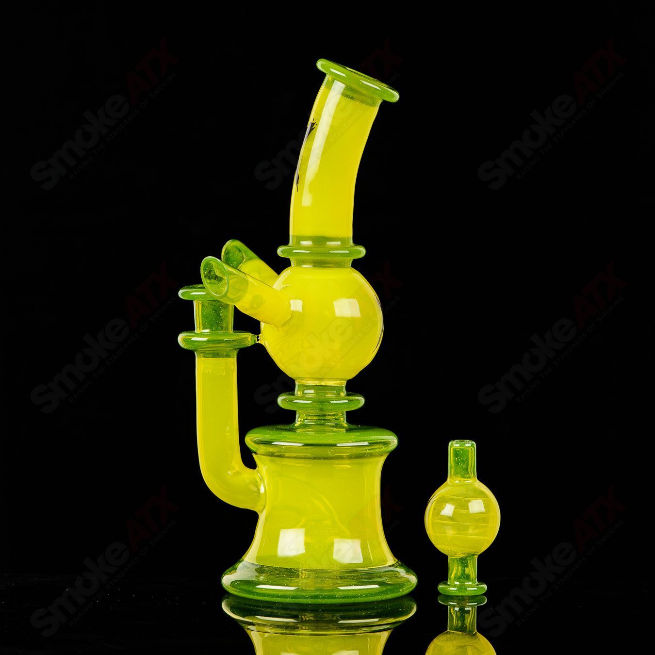 Colorful Xhalerator RAM Robert Mickelsen glass concentrate rig with intricate design and vibrant hues, designed for dabbing.