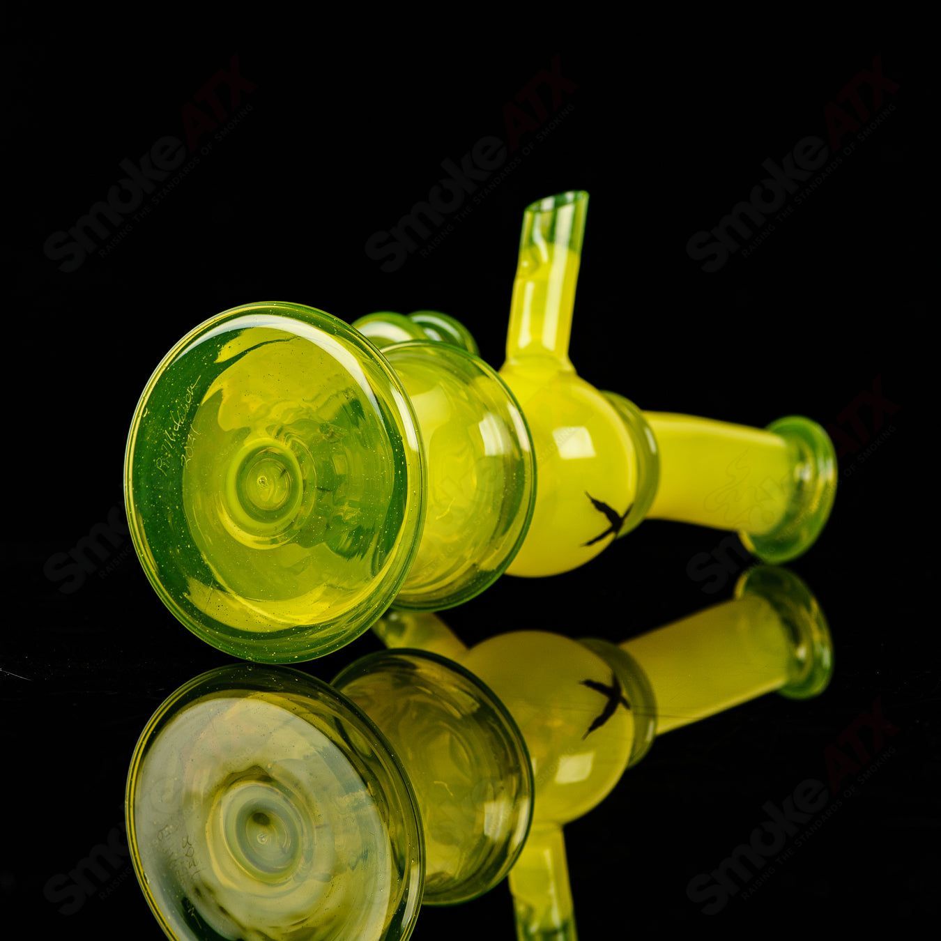 Colorful Xhalerator RAM Robert Mickelsen glass concentrate rig with intricate design and vibrant glasswork for dabbing.