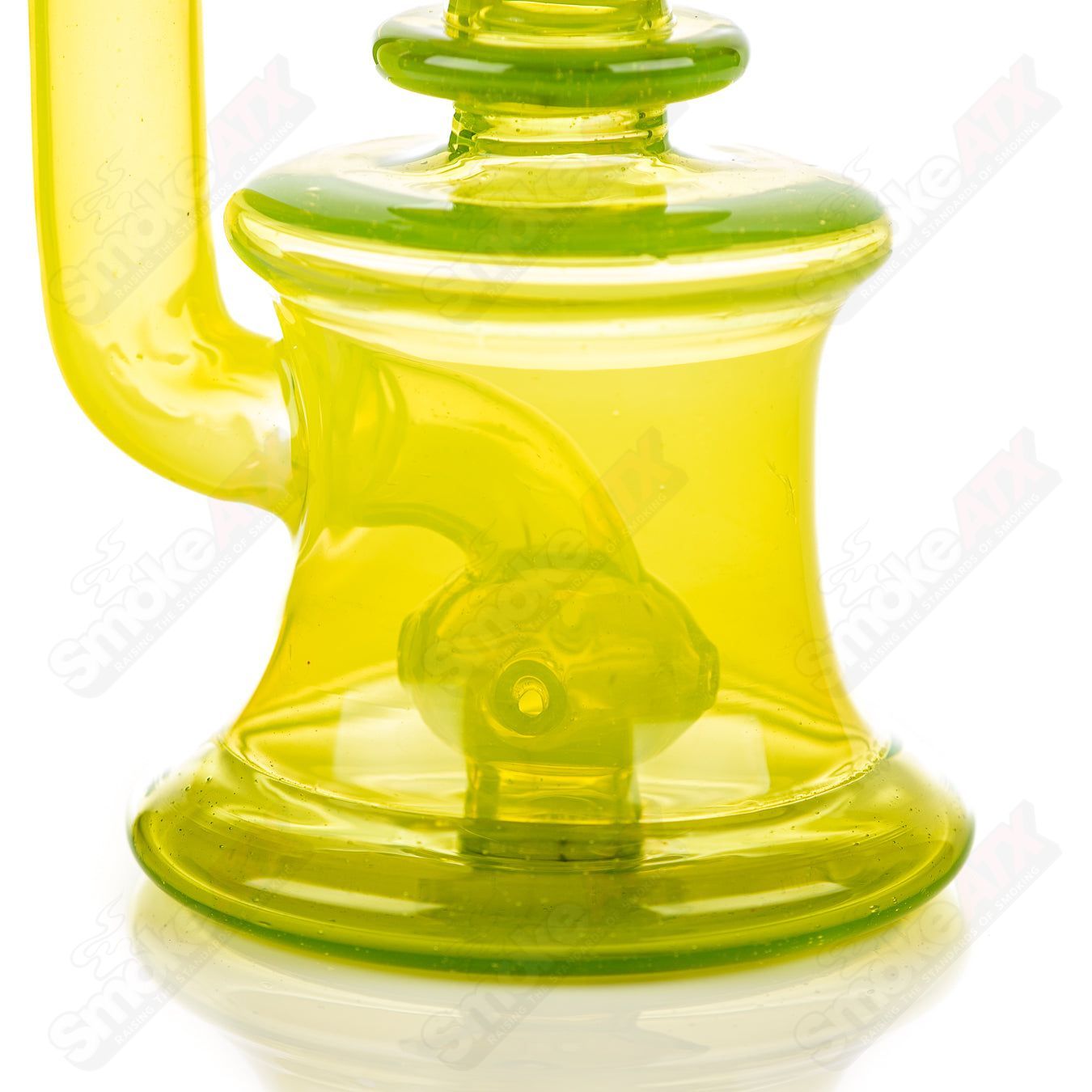 Colored Xhalerator RAM Robert Mickelsen glass concentrate rig with vibrant hues and intricate glasswork.